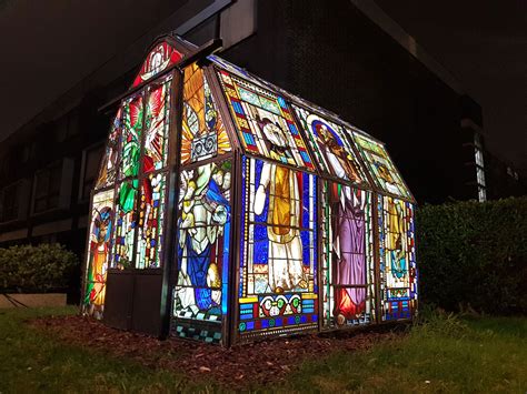 a glowing greenhouse of distorted stained glass