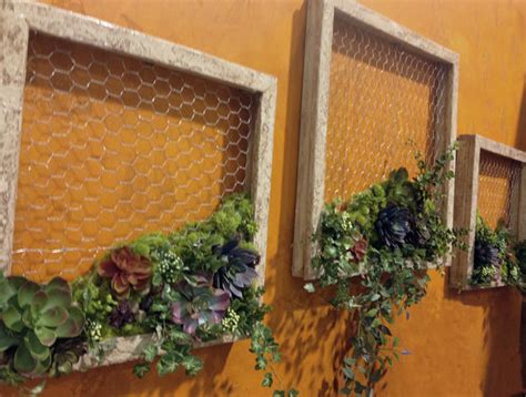 It may be a flower garden or sculpture garden. Succulent Garden DIY Wall Decor | FaveCrafts.com