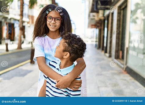 African American Brother And Sister Smiling Happy Outdoors Stock Photo