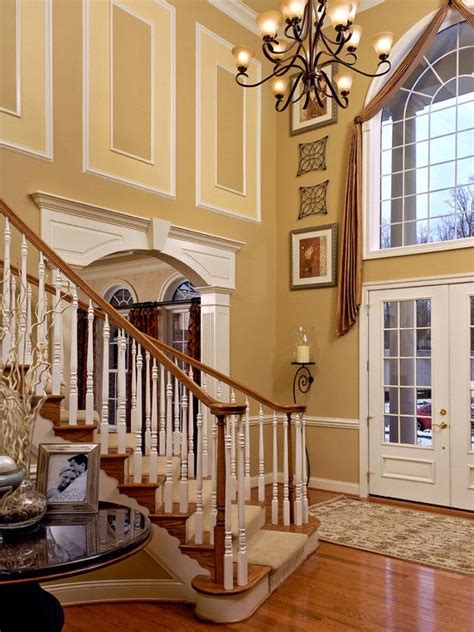 Two Story Foyer Wall Decorating Ideas