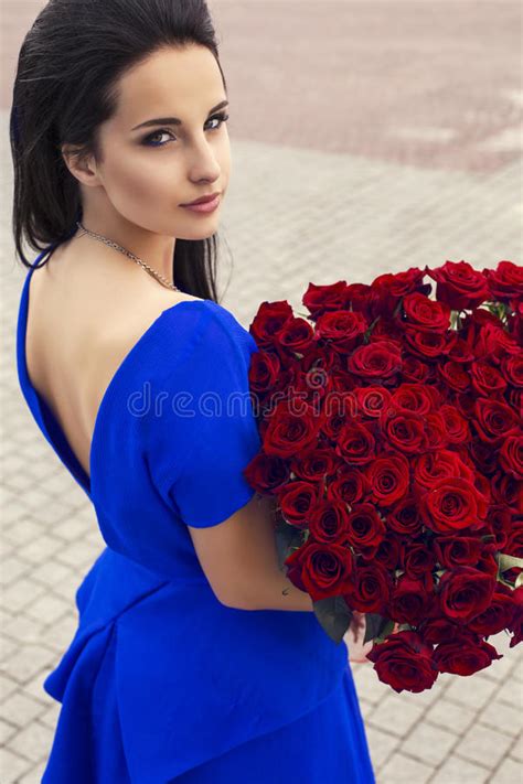 Beautiful Elegant Girl With A Bouquet Of Red Roses Stock Image Image