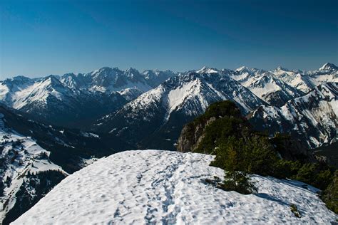 Snow Capped Mountain Ranges · Free Stock Photo