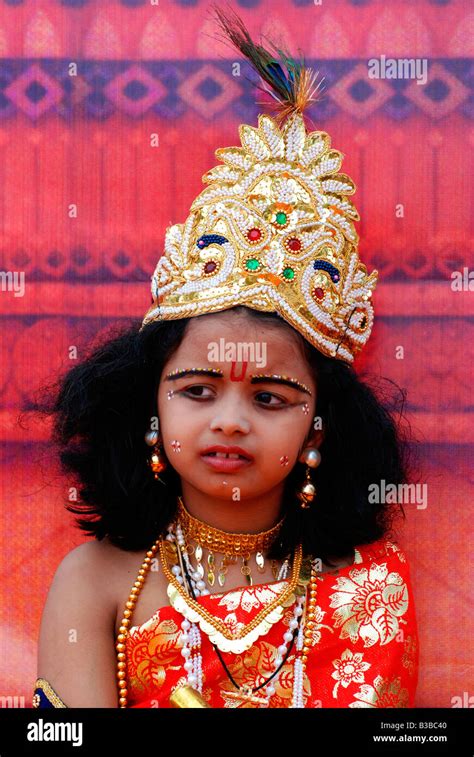 Little Krishna A Small Boy Posing As Lord Krishna In A Balagokulam