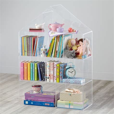 Sweet girl's room with land of nod jenny lind bookcase in azure filled with books, stuffed animals and japanese eraser collection. 15 Photos Land Of Nod Bookcases