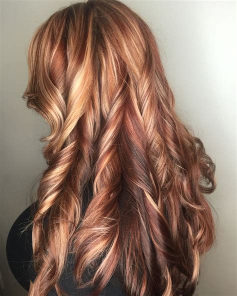 A color like this is quite versatile and can be brightened up or toned down to go with your. Blonde and red highlights copper lowlights red hair blonde ...