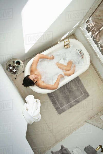Woman Having Bubble Bath In Bathroom Stock Photo Dissolve