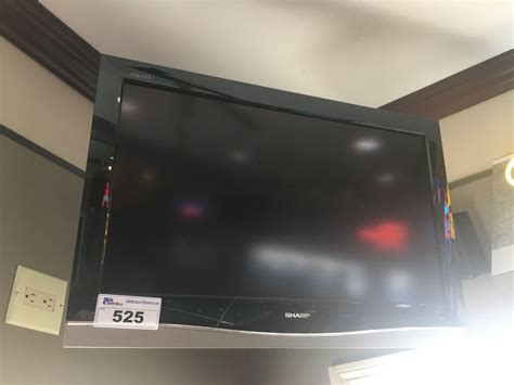 Deep blacks and bright whites. SHARP AQUOS 32 INCH LCD TV - Able Auctions