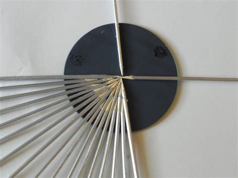 Beveled wall mirror is constructed of gorgeous glass pieces that are arranged in a pretty beveled design. Smart n Snazzy: DIY ~ Sunburst Mirror Wall Decor