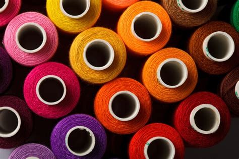 Premium Photo Sewing Threads Multicolored Background Closeup