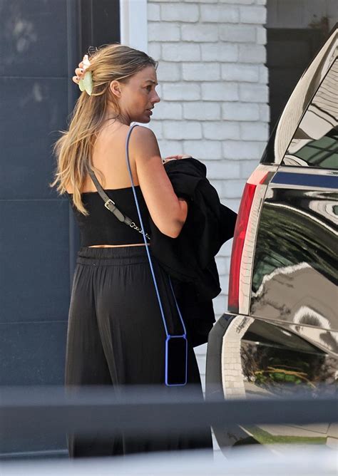 See Pics Of Margot Robbie After Leaving Cara Delevingnes House