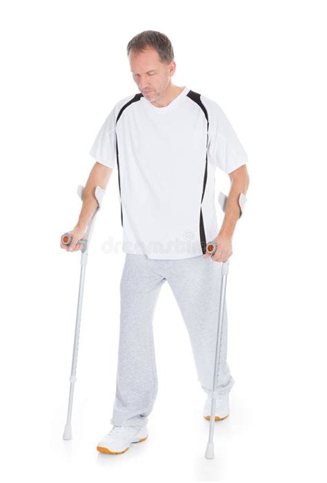 Mature Man With Crutches Stock Photo Image Of Casual 57200422