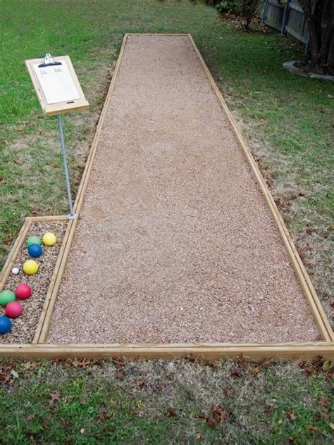 Faced with the task of building a bocce ball court on a budget, we kicked our problem solving into gear and came up with a $300 solution you can do yourself for less than a third of what you'd spend with traditional materials. Build an Outdoor Bocce Court | Bocce ball court, Bocce ...