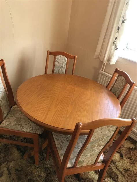 With a couple of stackable adde chairs within easy reach, there's always room for more. Solid wood round dining table & 4 chairs | in Norwich ...