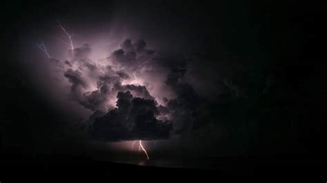 Thunderstorm And Lightning Over The Ocean And Land Stockfreedom