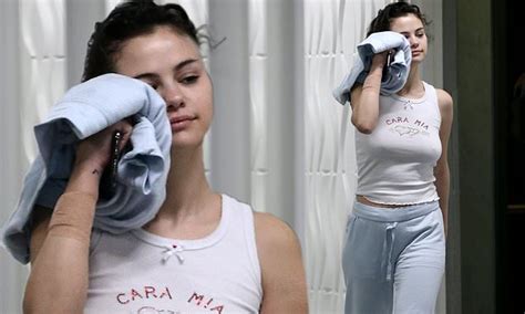 Selena Gomez Goes Braless In White Tank Top And Sweatpants As She