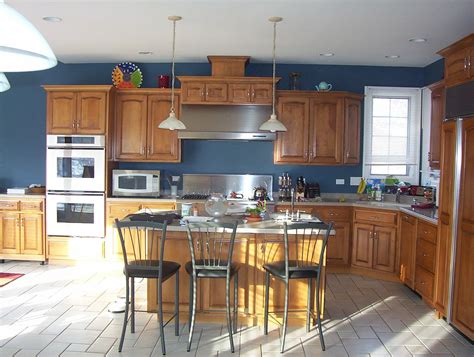 Kitchen With Blue And Wood Cabinets Lucasjoubert