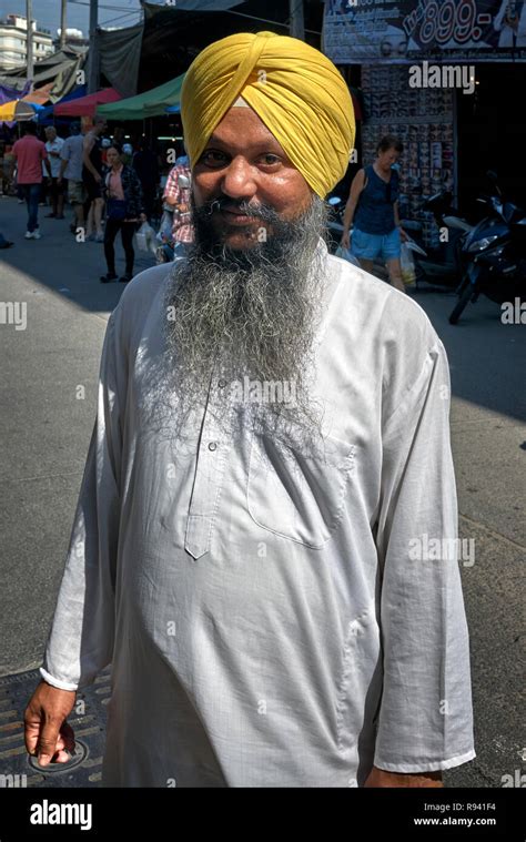 indian sikh portrait of an indian sikh man in traditional kurta pajama shirt and turban