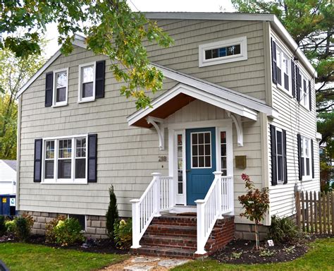 The house has one five ton unit with three zones (two down and one up) and three return air ducts located in the ceiling. SoPo Cottage, love the new entrance | Beige house exterior ...