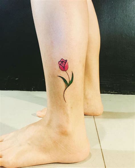 We have tulip tattoo ideas, designs, symbolism and we explain the meaning behind the tattoo. Yellow Tulip Tattoo Meaning - Best Tattoo Ideas