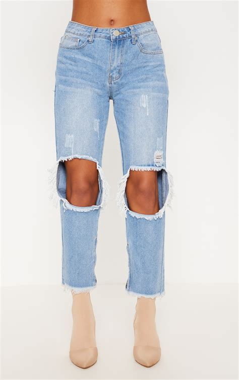 Mid Wash Distressed Straight Leg Jeans Prettylittlething