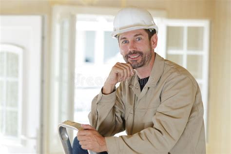 Construction Worker Looking At Camera Stock Image Image Of Wall