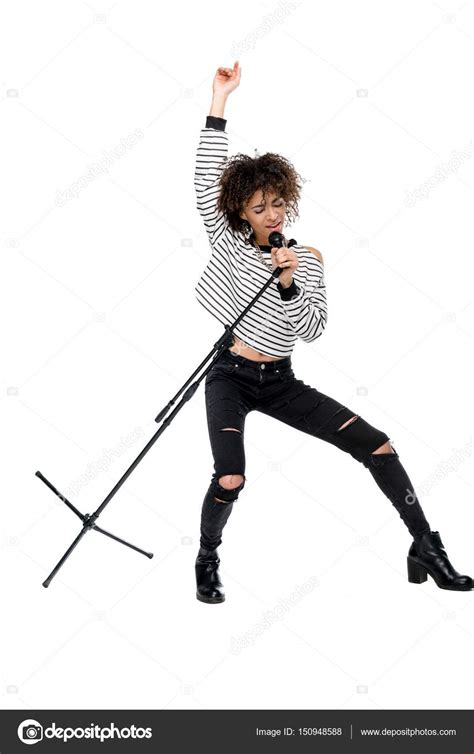Young Singer With Microphone — Stock Photo © Dmitrypoch 150948588