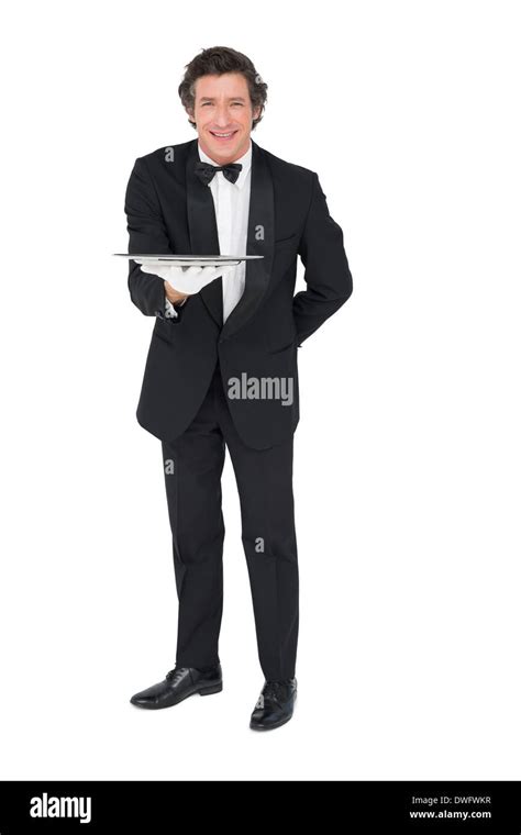 Portrait Of Waiter Holding Tray Over White Background Stock Photo Alamy