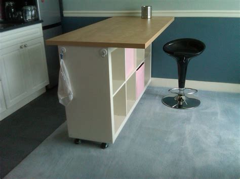 Counter height work table with storage. IKEA Counter Height Table Design Ideas - HomesFeed