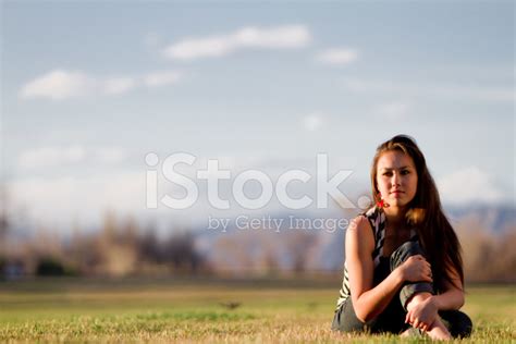 Pretty Girl In Grass At Dusk Stock Photo Royalty Free Freeimages