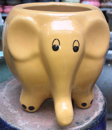 Yellow Elephant Ceramic Pot —