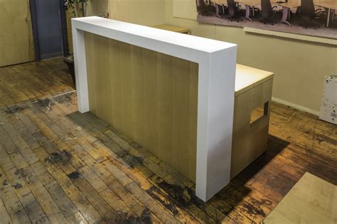 Custom 85 X 65 L Shaped Maple Reception Desk With White Stone