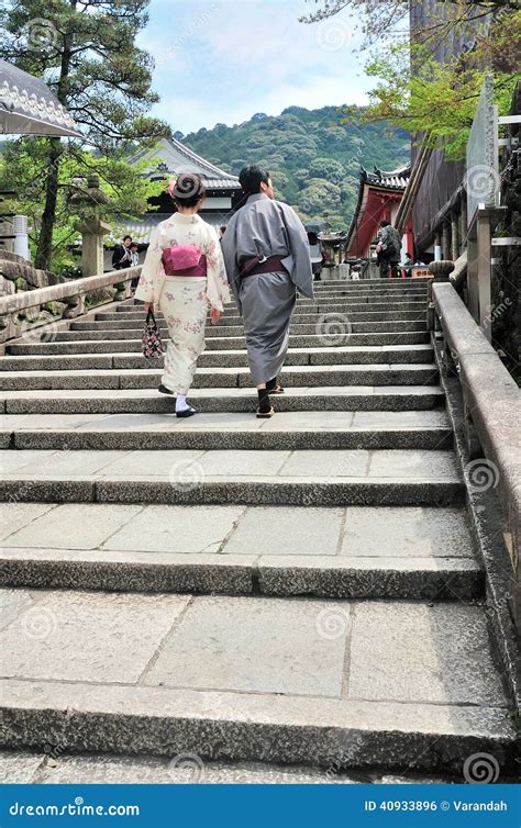 Young Japanese Yukata Couple Walk Together To The Shrine Editorial