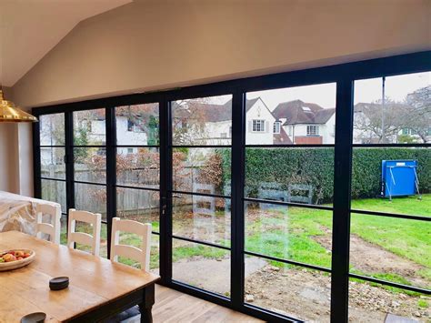 Bi fold steel door by steel entry premium windows and doors offers the highest quality our architectural bifolding window and door solutions utilize numerous steel and glass panels hinged in the adjacent leaf can offer a french door application. STEEL REPLACEMENT B-FOLD DOORS · 1st Folding Sliding Doors