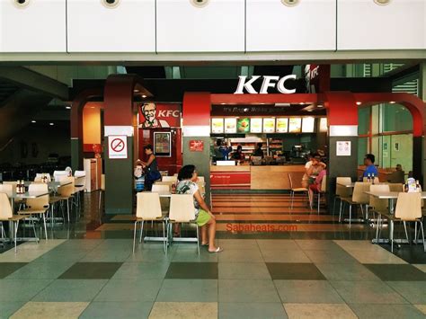 The meal consists of a crispy chicken burger. Foods at Kota Kinabalu Airport Terminal 1 (KKIA) - Sabah Eats