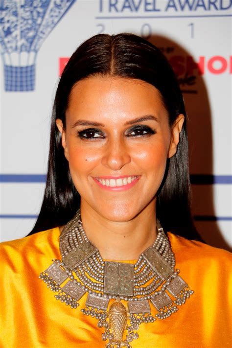 Neha Dhupia Looks Hot In Yellow Dress At Lonely Planet