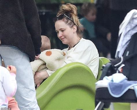 Jennifer Lawrence Makes The Rare Move Of Holding Her Son Cy In Public