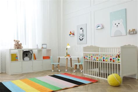 Cute Baby Room Interior With Stylish Furniture And Toys Stock Image