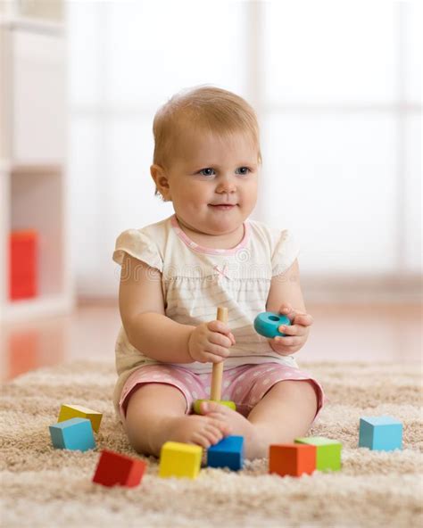 Adorable Cute Beautiful Little Baby Girl Playing With Educational