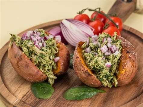 Put the potatoes on a sheet pan and bake for 30 minutes. Chicken Pesto-Stuffed Sweet Potatoes
