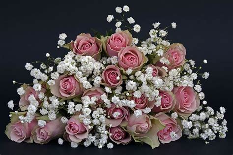Centerpiece Pink Roses Babys Breath Essex Florist And Greenhouses Inc