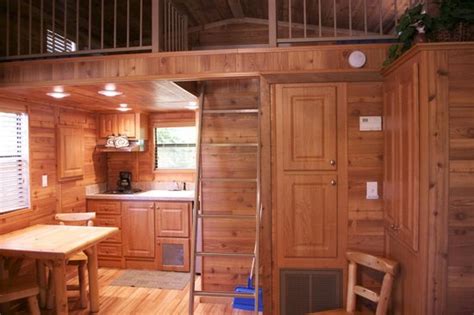 Mobile app · earn rental income · unique rentals · list your property Inside Deluxe Cabin - Picture of Petoskey KOA, Petoskey ...
