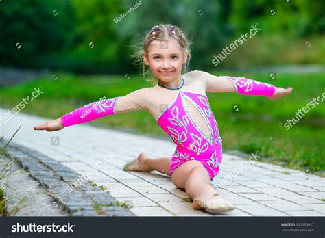 Flexible Little Girl Doing Gymnastics Split Stock Photo 315050057