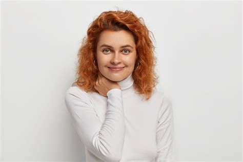 Free Photo Headshot Of Pleasant Looking Ginger Woman With Satisfied