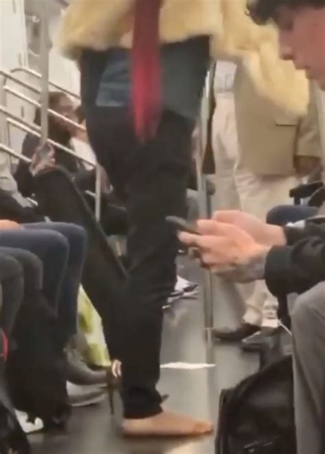 Woman Whacks Elderly Subway Preacher With High Heels Video