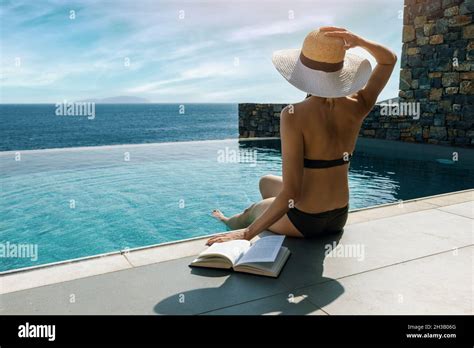 Sunbathing In Swimming Pool Hi Res Stock Photography And Images Alamy