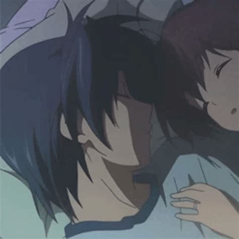 Two Anime Characters Hugging Each Other With Their Heads Close To One Another In The Background