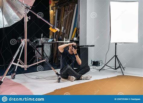 Photographer Working In Studio Stock Photo Image Of Shooting Session