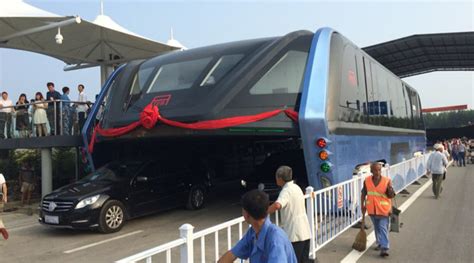 China Test Runs Futuristic Bus That Drives Above Traffic Pictures And