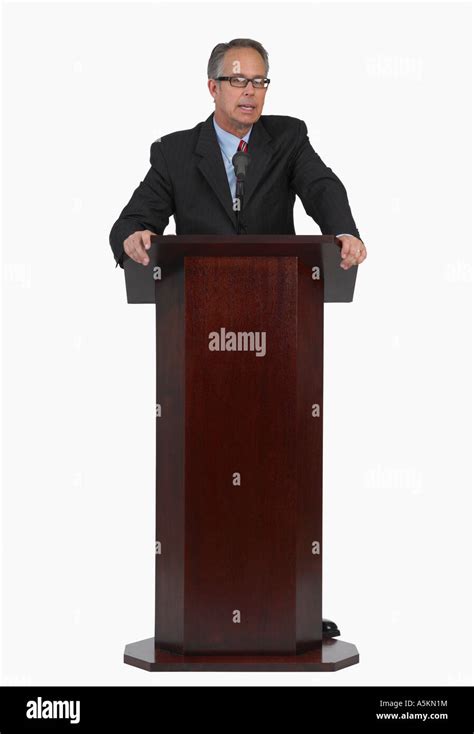 Businessman Speaking At Podium Stock Photo Alamy