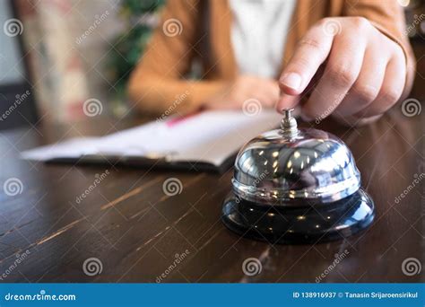 Women Call Hotel Reception With Finger Push A Bell In Lobby Hotel